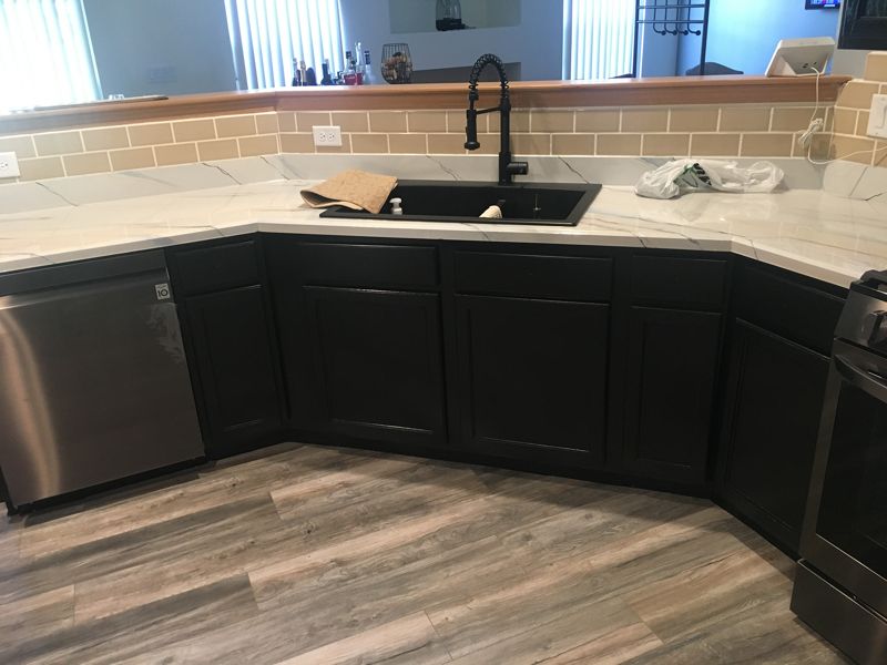 Lower kitchen cabinets painted black